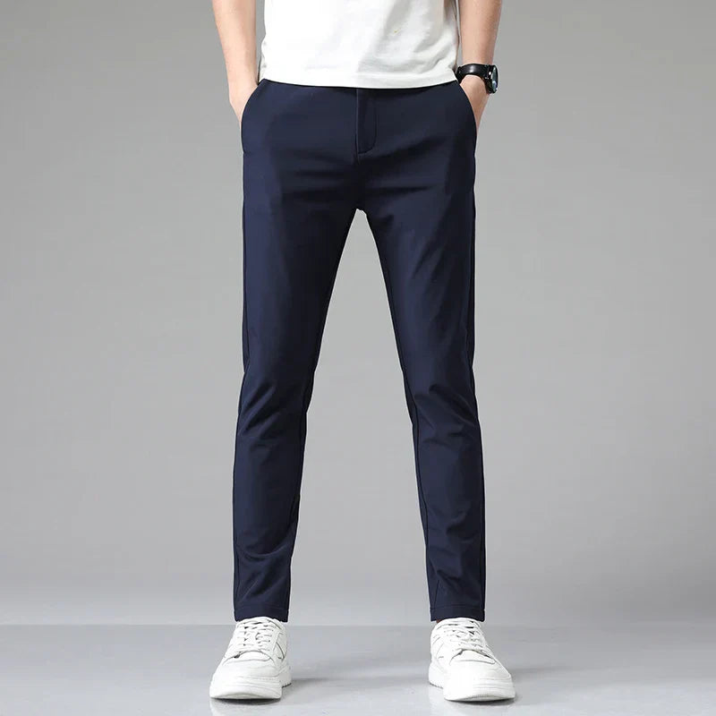 Calça Social Masculina Rauffstein RS203, com corte slim fit e tecido de nylon e spandex, perfeita para eventos formais, corporativos ou uso diário.