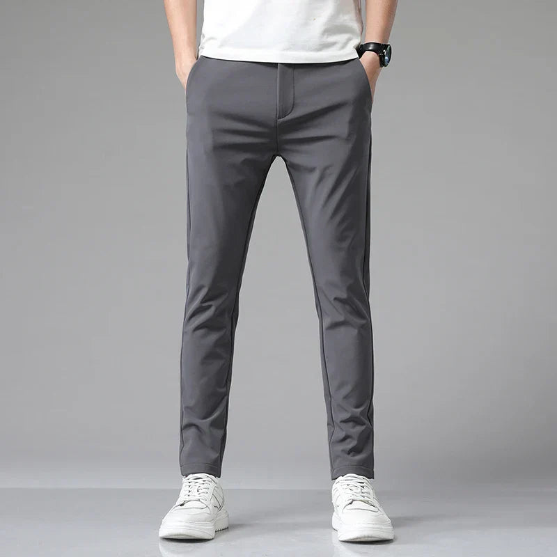 Calça Social Masculina Rauffstein RS203, com corte slim fit e tecido de nylon e spandex, perfeita para eventos formais, corporativos ou uso diário.