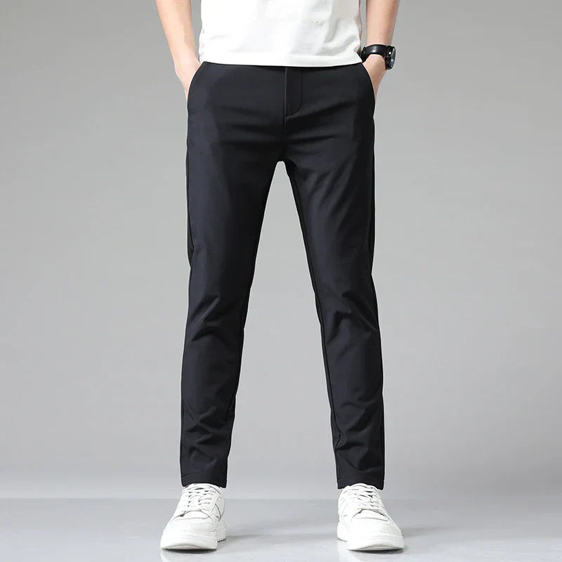Calça Social Masculina Rauffstein RS203, com corte slim fit e tecido de nylon e spandex, perfeita para eventos formais, corporativos ou uso diário.