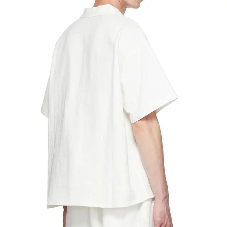 Camisa Linho Oversized Masculina Rauffstein RS345, modelagem ampla, tecido respirável e tecnologia anti amassado para um visual moderno e confortável.