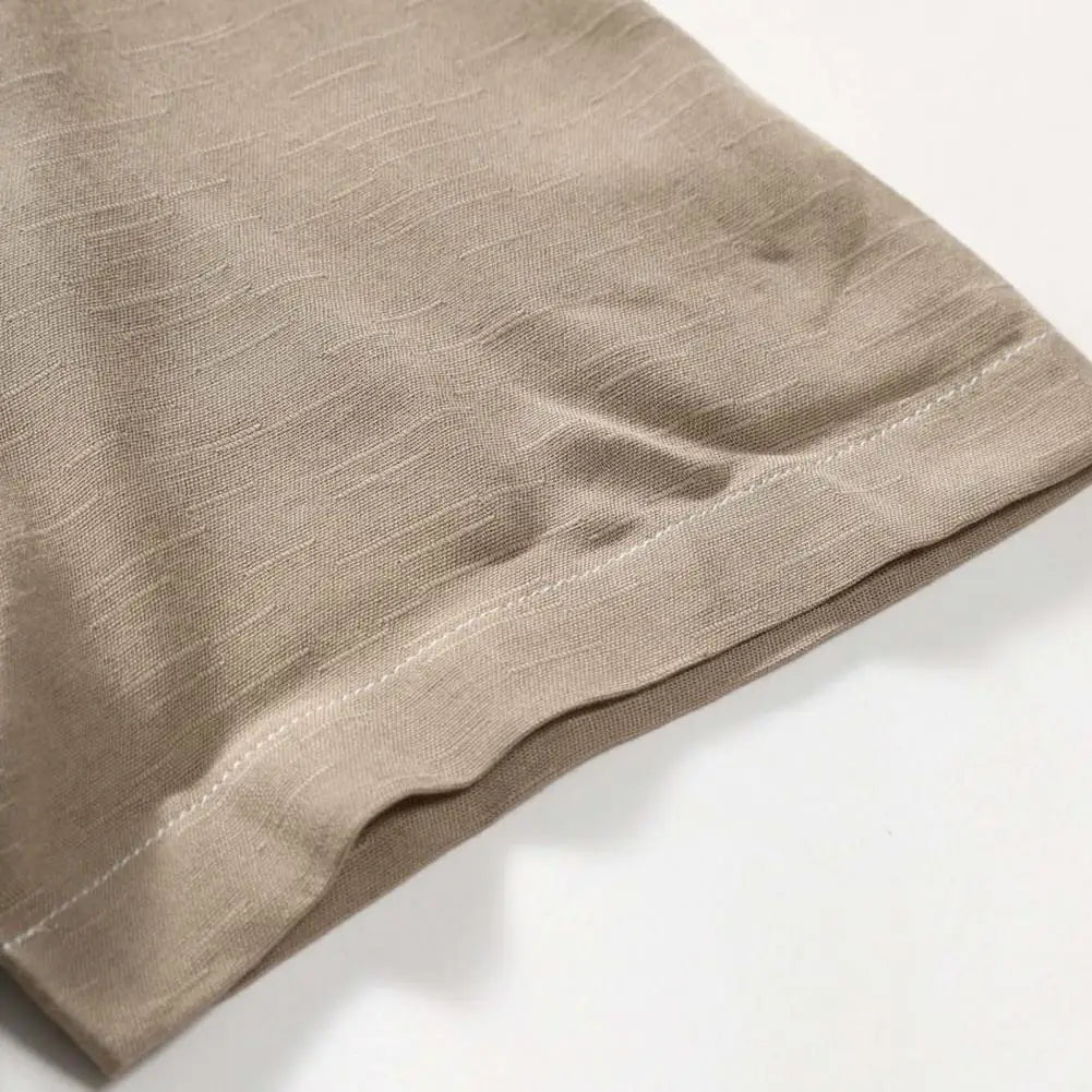 Camisa Manga Curta Lisa Rauffstein RS082, modelagem ajustada, tecido leve e design minimalista para sofisticação sem esforço.