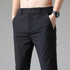 Calça Social Masculina Rauffstein RS203, com corte slim fit e tecido de nylon e spandex, perfeita para eventos formais, corporativos ou uso diário.
